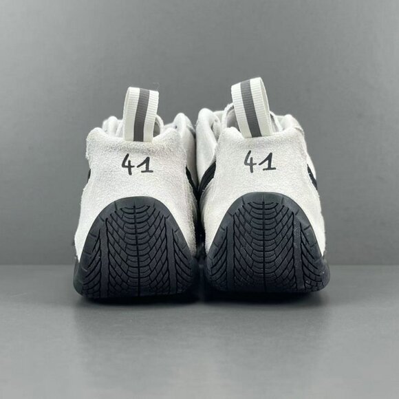 Puma Black And White Thin-Soled Low-Top Sneakers - Picture 2 of 11